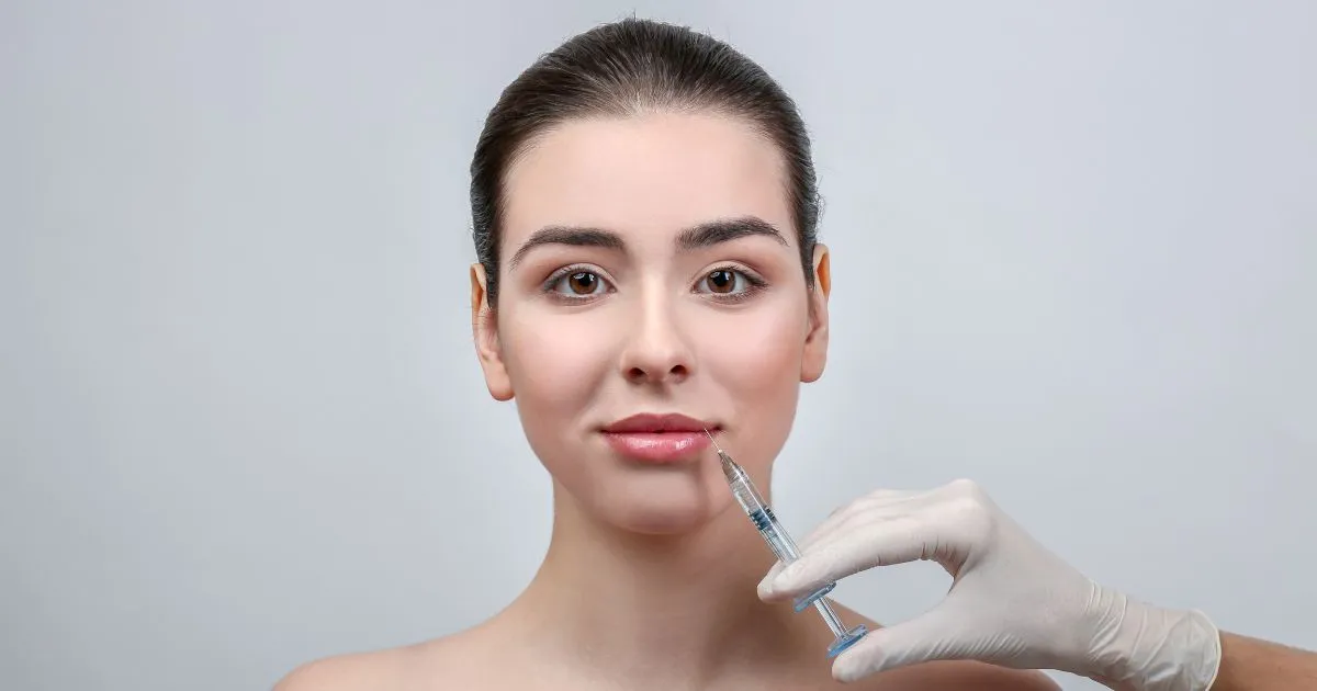 Vibrant woman receiving Injectable Lip Fillers in Round Rock, TX for a fresh look